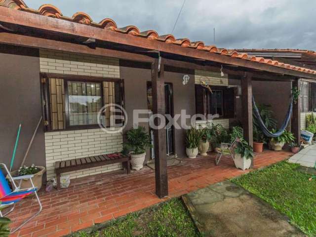 Casa com 3 quartos à venda na Rua Emílio Dimari, 190, Ponta Grossa, Porto Alegre, 130 m2 por R$ 550.000