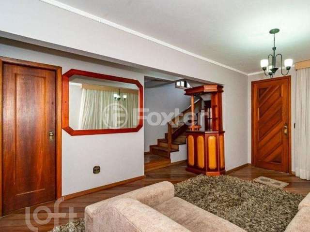 Casa com 3 quartos à venda na Rua Vicente Marsiglia Filho, 206, Jardim Leopoldina, Porto Alegre, 200 m2 por R$ 655.000