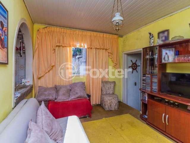 Casa com 3 quartos à venda na Rua Coronel Tisiano F. de Leoni, 240, Coronel Aparício Borges, Porto Alegre, 308 m2 por R$ 361.000