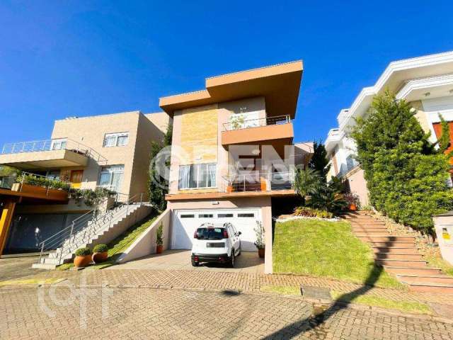 Casa em condomínio fechado com 3 quartos à venda na Avenida Santos Ferreira, 3125, Marechal Rondon, Canoas, 365 m2 por R$ 2.025.000