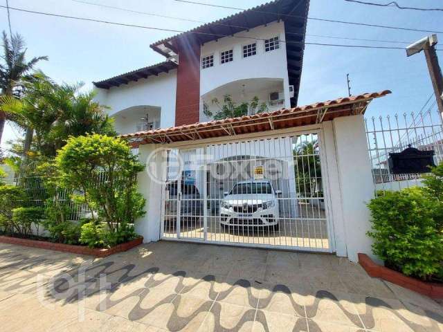 Casa com 5 quartos à venda na Rua das Araucárias, 1175, Harmonia, Canoas, 410 m2 por R$ 800.000