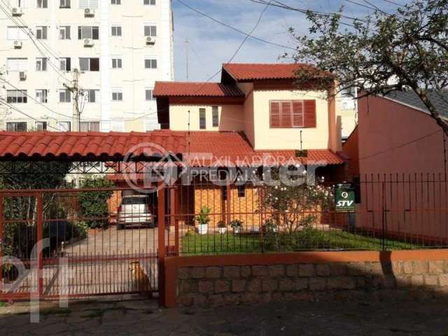 Casa com 3 quartos à venda na Rua Investigador Pedro Loeci Martins, 127, Nonoai, Porto Alegre, 330 m2 por R$ 580.000