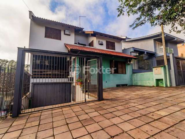 Casa com 5 quartos à venda na Rua Araponga, 387, Chácara das Pedras, Porto Alegre, 335 m2 por R$ 1.490.000