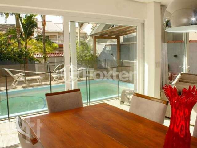 Casa com 3 quartos à venda na Rua da Amizade, 131, Estância Velha, Canoas, 124 m2 por R$ 929.000