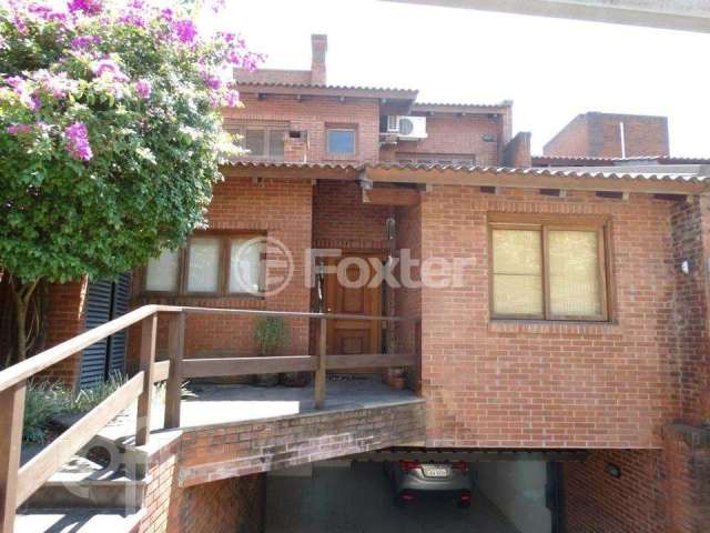 Casa com 4 quartos à venda na Rua Bazilio Pellin Filho, 900, Tristeza, Porto Alegre, 400 m2 por R$ 1.590.000