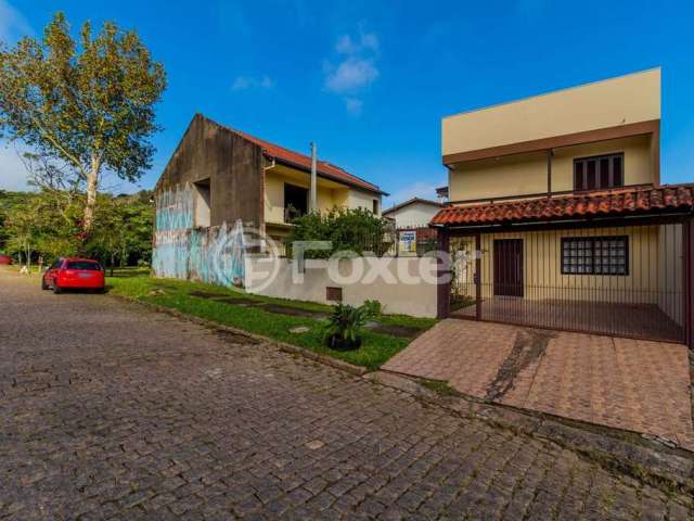 Casa com 2 quartos à venda na Rua Ari Peixoto Martins, 51, Espírito Santo, Porto Alegre, 128 m2 por R$ 480.000