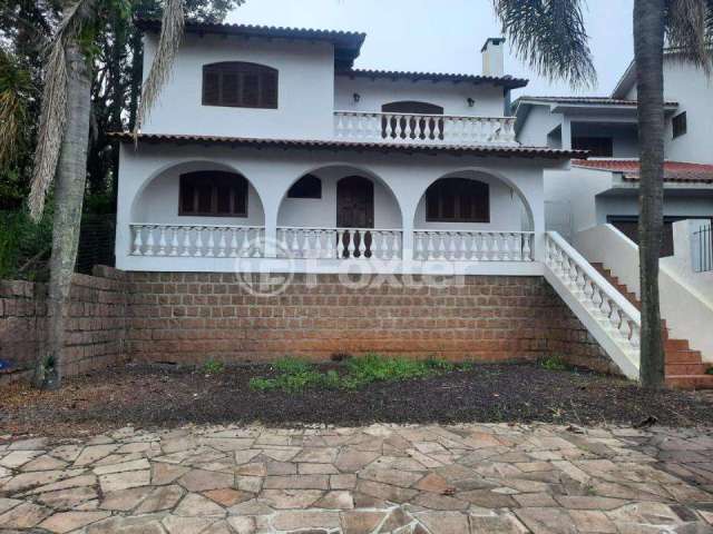 Casa em condomínio fechado com 3 quartos à venda na Avenida Senador Salgado Filho, 6863, São Lucas, Viamão, 300 m2 por R$ 1.000.000