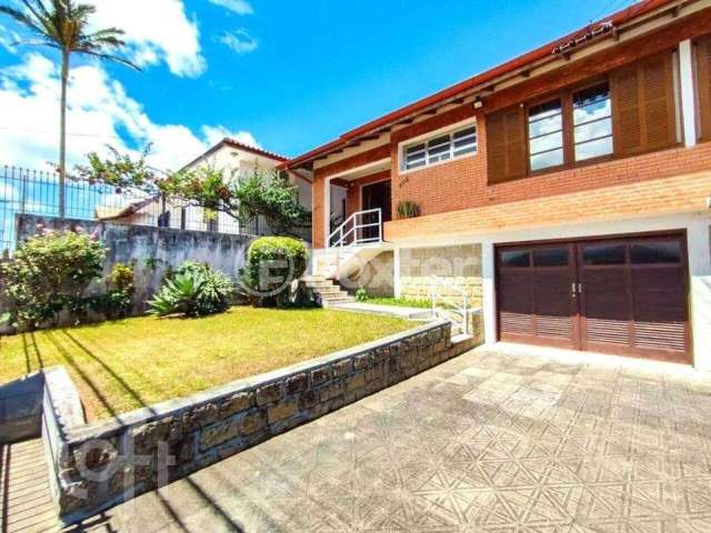 Casa com 3 quartos à venda na Rua Pascoal Simone, 305, Coqueiros, Florianópolis, 339 m2 por R$ 1.950.000