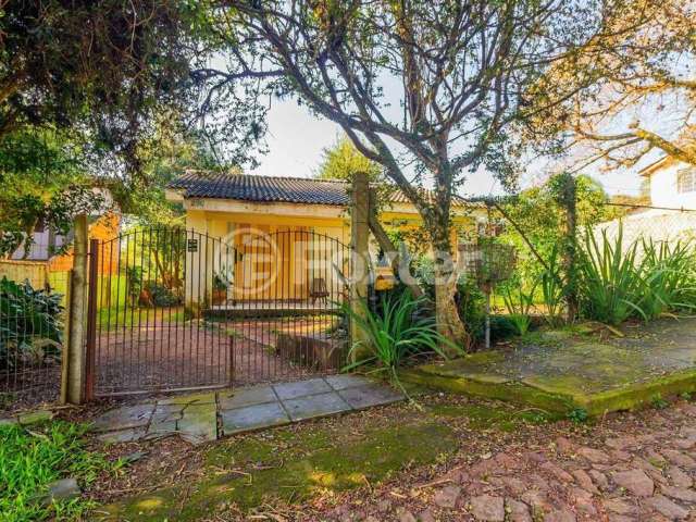 Casa com 4 quartos à venda na Rua Hygino Russi Lima, 290, Ponta Grossa, Porto Alegre, 150 m2 por R$ 290.000