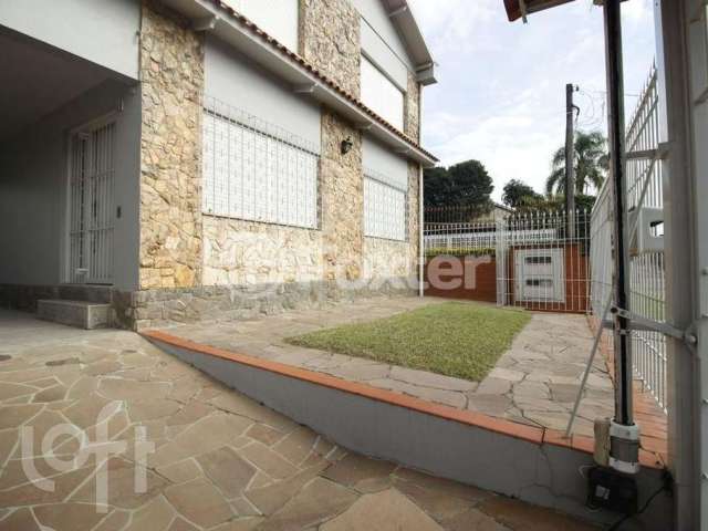 Casa com 5 quartos à venda na Rua Tupi, 691, Igara, Canoas, 244 m2 por R$ 899.000