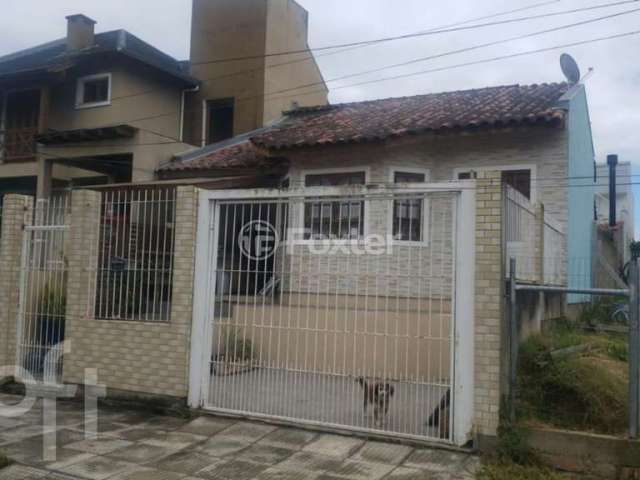 Casa com 3 quartos à venda na Rua Doutor Cláudio Walter Ferreira da Silva, 171, Guarujá, Porto Alegre, 200 m2 por R$ 600.000