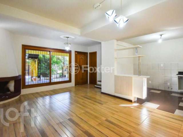 Casa em condomínio fechado com 3 quartos à venda na Rua Mura, 120, Guarujá, Porto Alegre, 154 m2 por R$ 600.000