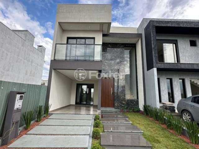 Casa em condomínio fechado com 3 quartos à venda na Avenida Centenário, 1011, Passo das Pedras, Gravataí, 150 m2 por R$ 889.000