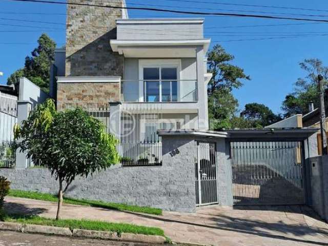 Casa com 3 quartos à venda na Rua Jacarandá, 198, São José, Sapucaia do Sul, 300 m2 por R$ 1.200.000