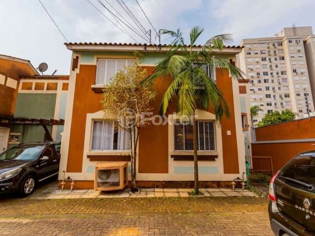 Casa em condomínio fechado com 3 quartos à venda na Rua Tenente Ary Tarrago, 1720, Jardim Itu Sabará, Porto Alegre, 85 m2 por R$ 415.000