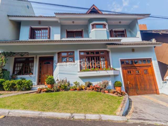 Casa em condomínio fechado com 3 quartos à venda na Avenida Vicente Monteggia, 2000, Cavalhada, Porto Alegre, 252 m2 por R$ 1.690.000