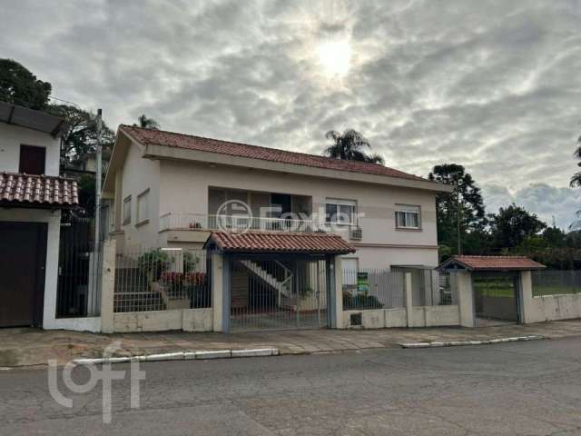 Casa com 5 quartos à venda na Rua Epitácio Pessoa, 425, Primavera, Novo Hamburgo, 295 m2 por R$ 900.000