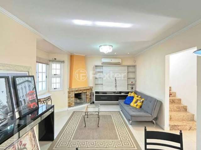 Casa com 3 quartos à venda na Avenida José Corrêa da Silva, 458, Cavalhada, Porto Alegre, 119 m2 por R$ 690.000