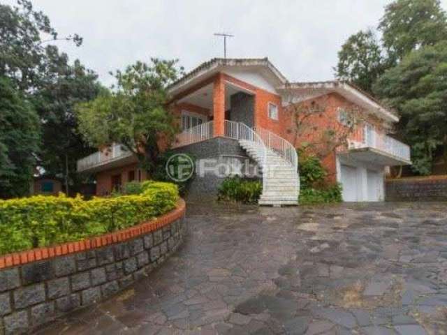 Casa com 4 quartos à venda na Avenida Pereira Passos, 246, Vila Assunção, Porto Alegre, 611 m2 por R$ 6.000.000