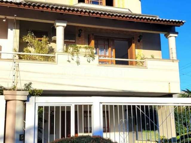 Casa com 3 quartos à venda na Rua Manacás, 463, Estância Velha, Canoas, 198 m2 por R$ 980.000