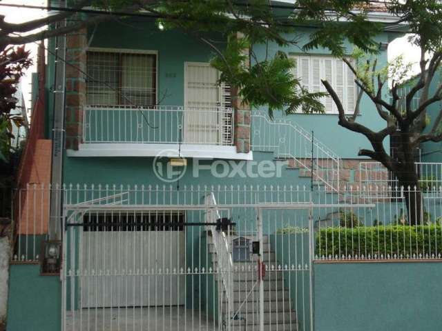 Casa com 3 quartos à venda na Rua Guilherme Schell, 253, Santo Antônio, Porto Alegre, 233 m2 por R$ 770.000