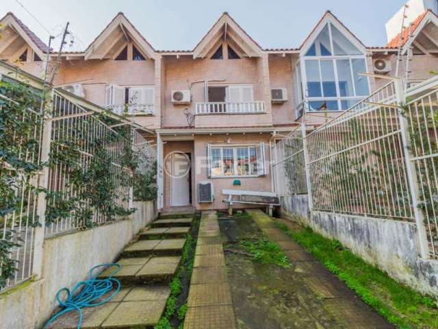 Casa com 2 quartos à venda na Rua Heitor Kramer, 324, Guarujá, Porto Alegre, 120 m2 por R$ 450.000