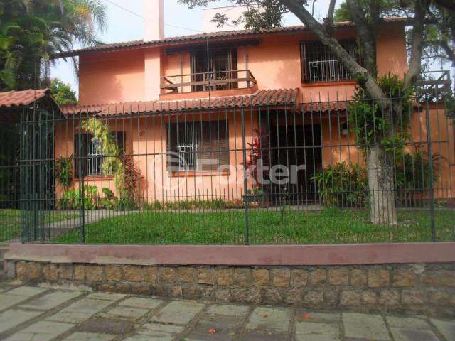 Casa com 5 quartos à venda na Rua Itapitocaí, 725, Cristal, Porto Alegre, 225 m2 por R$ 1.915.000