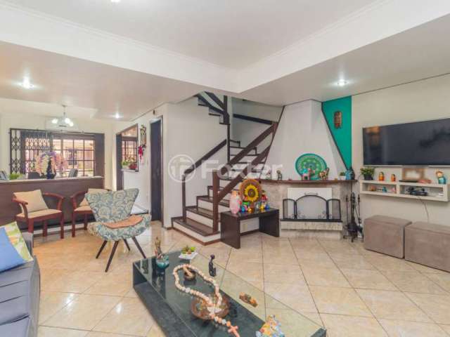 Casa com 3 quartos à venda na Rua Doutor Egydio Michaelsen, 62, Cavalhada, Porto Alegre, 197 m2 por R$ 700.000