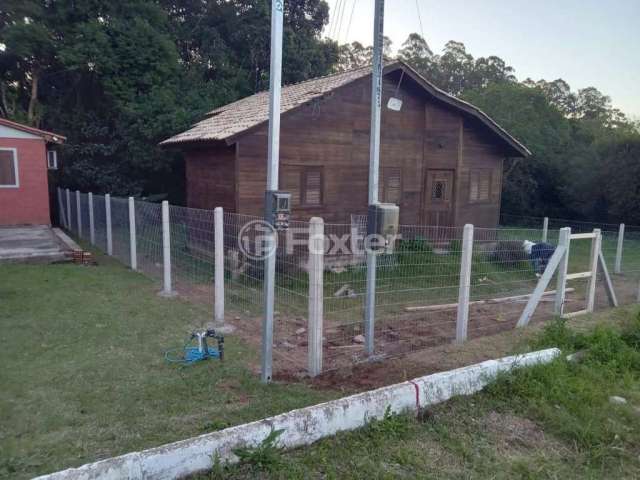 Casa com 2 quartos à venda na Rua Antônio C ávila, 50, Tarumã, Viamão, 65 m2 por R$ 145.000