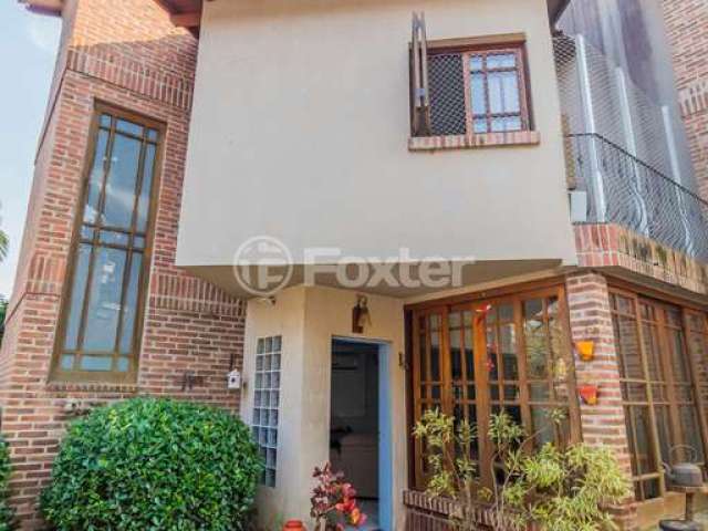 Casa em condomínio fechado com 3 quartos à venda na Rua João Mendes Ouriques, 570, Jardim Isabel, Porto Alegre, 166 m2 por R$ 690.000