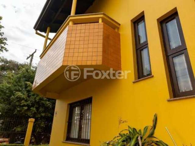 Casa com 3 quartos à venda na Rua Paulo Blaschke, 540, Jardim Itu Sabará, Porto Alegre, 310 m2 por R$ 1.100.000