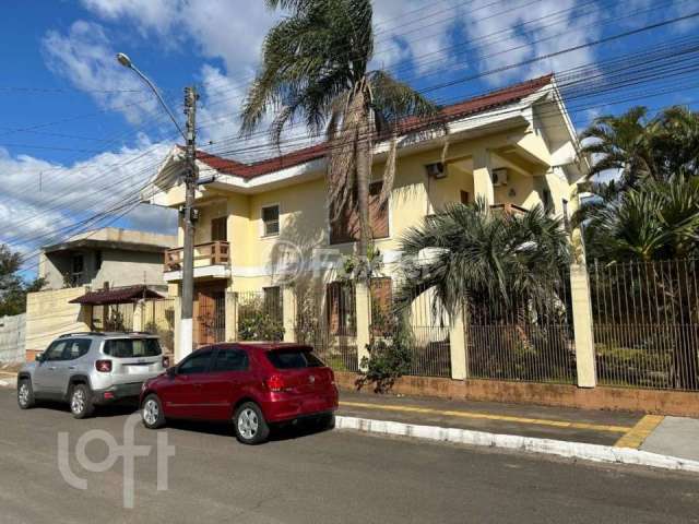 Casa com 3 quartos à venda na Rua Guarulhos, 96, Parque Florido, Gravataí, 274 m2 por R$ 1.040.000