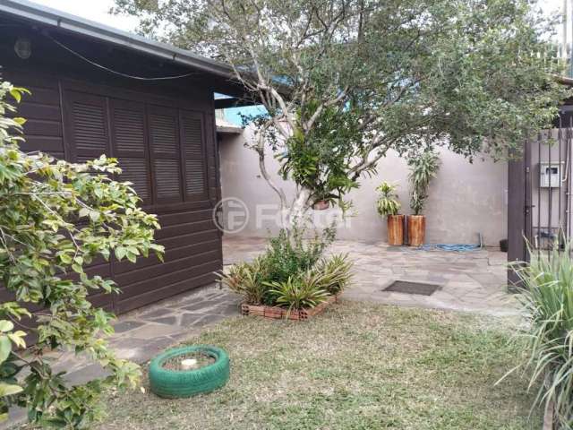 Casa com 4 quartos à venda na Rua Iara, 231, Parque Amador, Esteio, 150 m2 por R$ 480.000