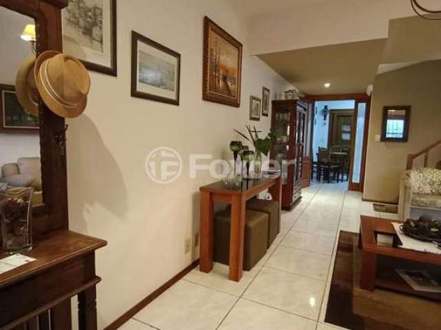 Casa com 2 quartos à venda na Rua Heitor Kramer, 139, Guarujá, Porto Alegre, 107 m2 por R$ 585.000