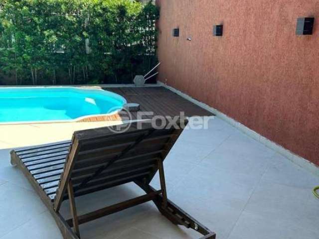 Casa com 3 quartos à venda na Rua Tucumã, 379, Enseada de Brito, Palhoça, 360 m2 por R$ 795.000