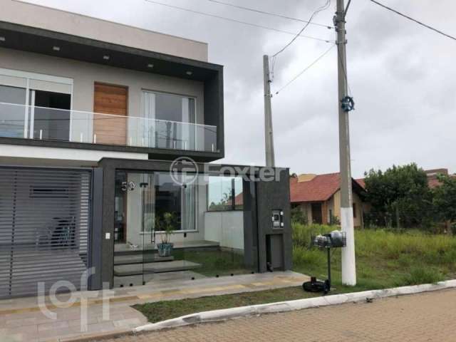 Casa com 3 quartos à venda na Rua José Henrique Barbosa dos Santos, 50, Dom Feliciano, Gravataí, 215 m2 por R$ 1.059.000