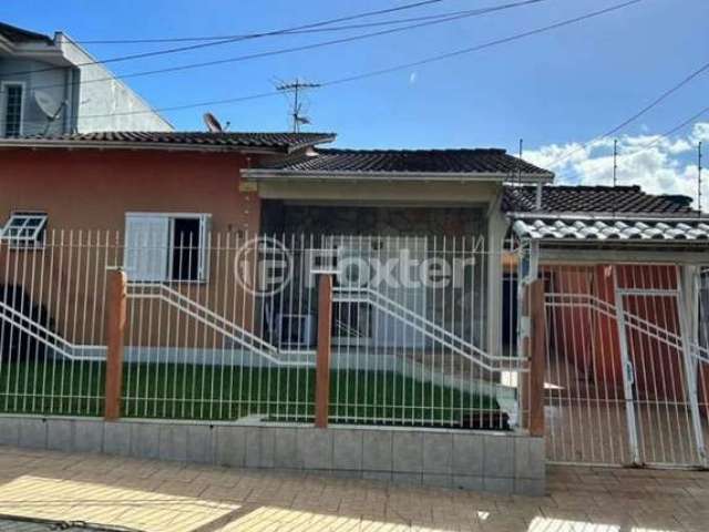 Casa com 3 quartos à venda na Avenida João Marciano, 105, Girassol, Gravataí, 130 m2 por R$ 586.000