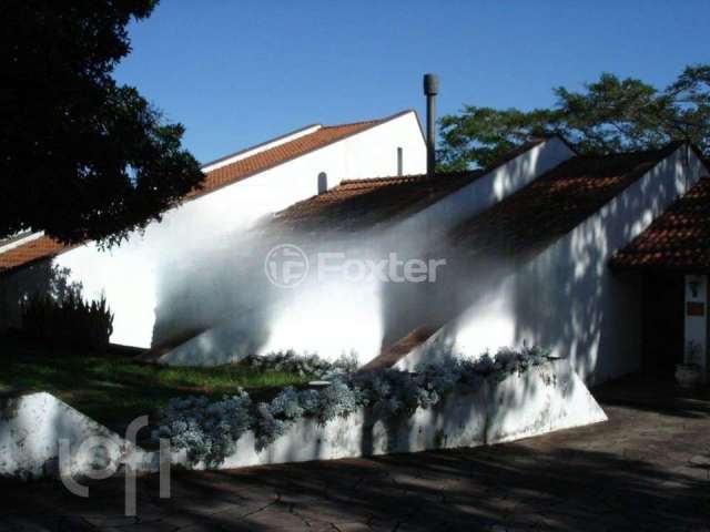 Casa com 4 quartos à venda na Avenida Arlindo Pasqualini, 765, Jardim Isabel, Porto Alegre, 516 m2 por R$ 1.280.000