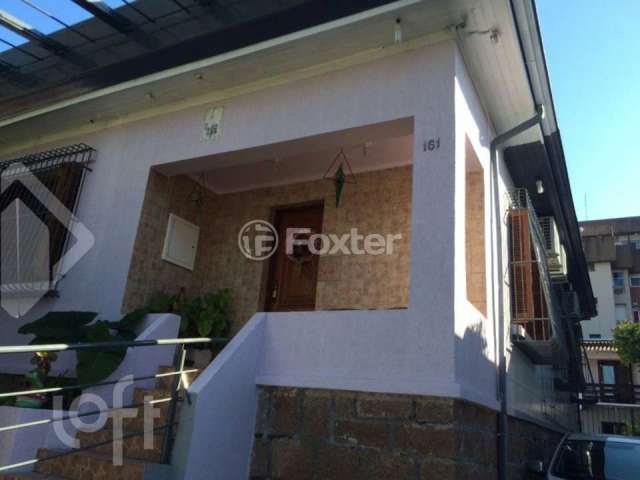 Casa com 5 quartos à venda na Rua Guilherme Schell, 161, Santo Antônio, Porto Alegre, 396 m2 por R$ 950.000