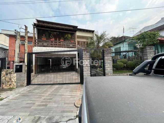 Casa com 4 quartos à venda na Rua Lindolfo Color, 95, Medianeira, Porto Alegre, 350 m2 por R$ 1.200.000