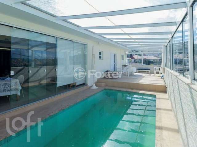 Casa com 4 quartos à venda na Rua Ivo Reis Montenegro, 46, Itaguaçu, Florianópolis, 200 m2 por R$ 1.890.900