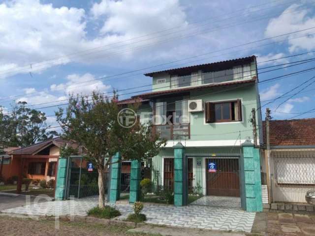 Casa com 5 quartos à venda na Rua Doutor Telmo Vergara, 554, Partenon, Porto Alegre, 331 m2 por R$ 1.199.000