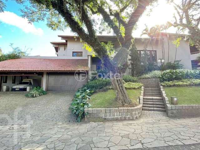 Casa em condomínio fechado com 7 quartos à venda na Avenida da Cavalhada, 5205, Cavalhada, Porto Alegre, 1075 m2 por R$ 5.300.000