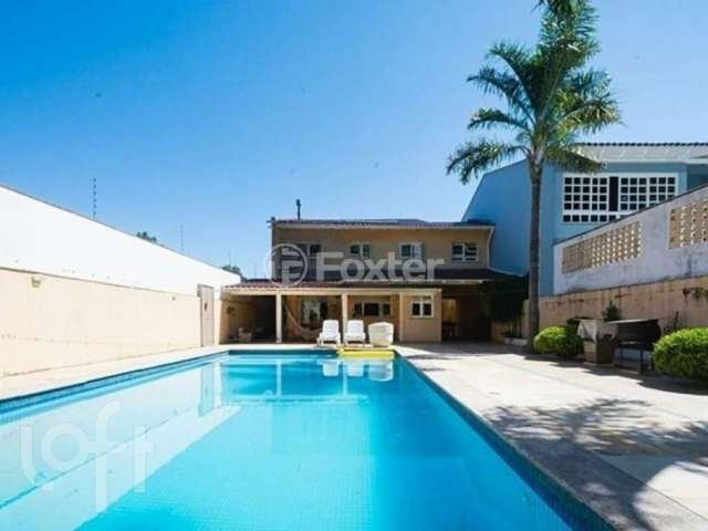 Casa com 4 quartos à venda na Avenida Saul Nonnenmacher, 112, Ipanema, Porto Alegre, 451 m2 por R$ 1.350.000