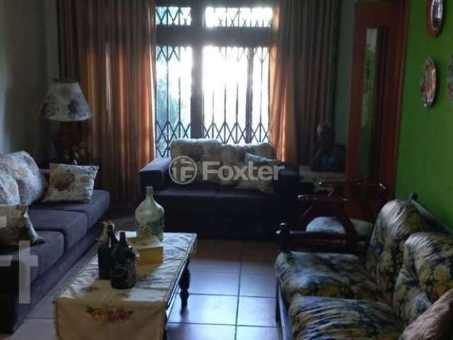 Casa com 4 quartos à venda na Rua Vinte e Cinco de Julho, 110, Santa Maria Goretti, Porto Alegre, 250 m2 por R$ 948.000