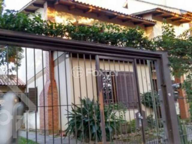 Casa com 5 quartos à venda na Rua Henrique Scliar, 142, Jardim Itu Sabará, Porto Alegre, 262 m2 por R$ 1.490.000