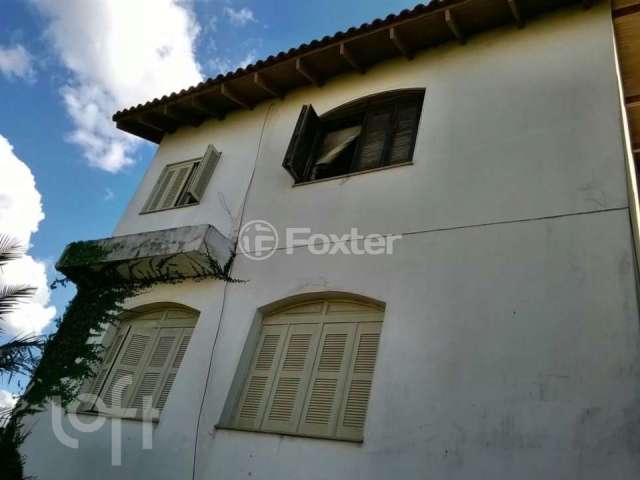 Casa com 2 quartos à venda na Rua Martim Minaberry, 432, Partenon, Porto Alegre, 250 m2 por R$ 478.000