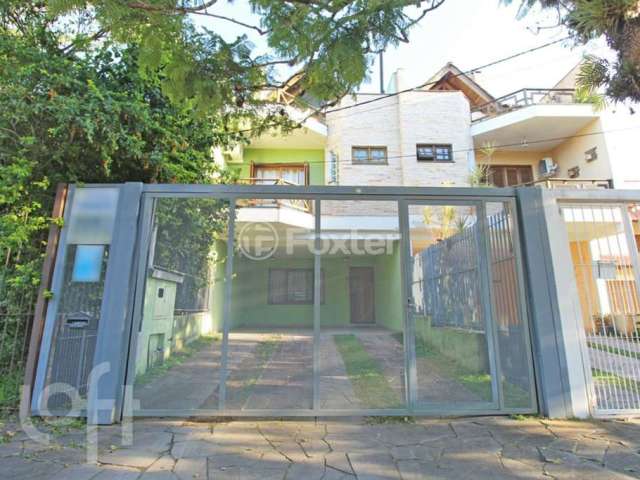 Casa com 3 quartos à venda na Rua Caribe, 36, Ipanema, Porto Alegre, 222 m2 por R$ 749.900