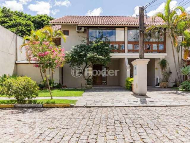 Casa em condomínio fechado com 3 quartos à venda na Avenida Eduardo Prado, 2050, Cavalhada, Porto Alegre, 233 m2 por R$ 1.080.000