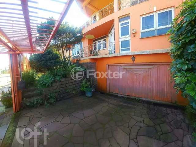 Casa com 4 quartos à venda na Rua Guabirobeira, 138, Jardim do Bosque, Cachoeirinha, 282 m2 por R$ 980.000